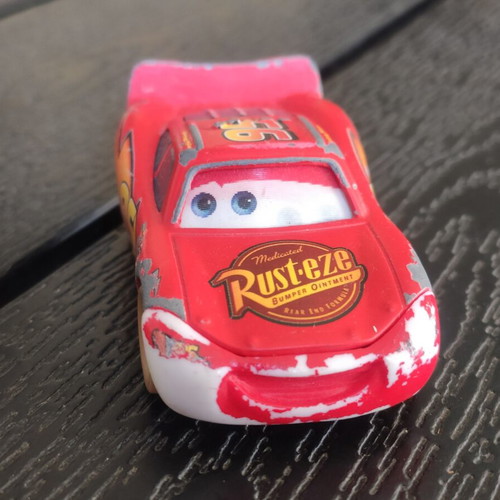 Disney Cars McQueen 1/55 toy car used with 3D eyes in fair condition