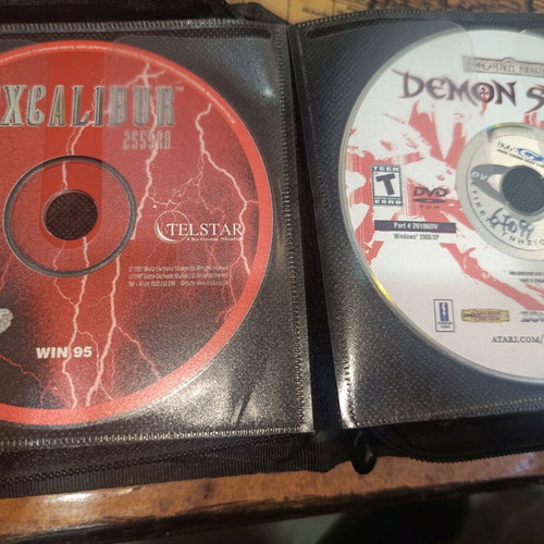 Case with various PC games and demos used