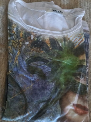 Blouse with female figure used, size M