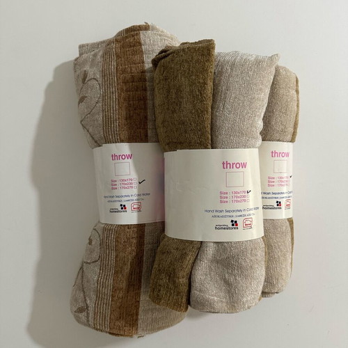 Home Stores Andreadis sofa throws set of 3 new, earth tones