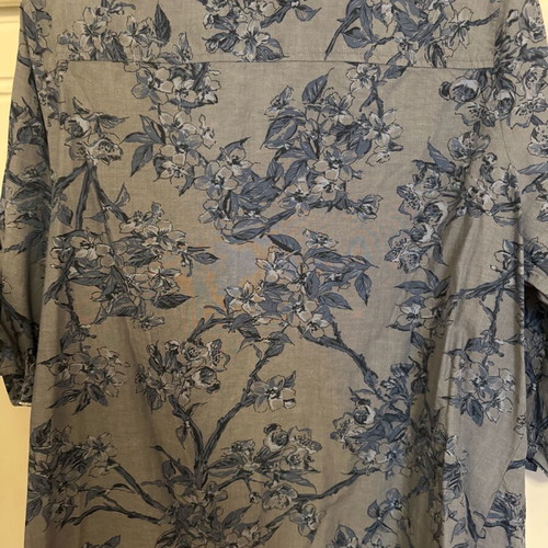 Blue shirt used with button on sleeve