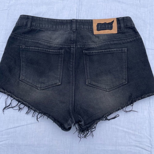 Only black denim shorts with rips like new, size 30