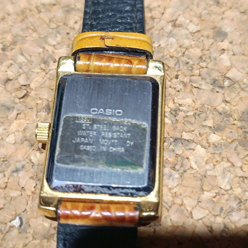 Casio women's watch used with brown leather strap