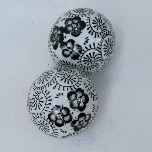 Vintage decorative porcelain spheres set like new with floral and geometric designs