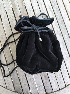 Velvet black handheld pouch like new