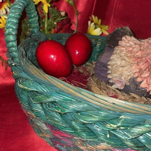 Woven Easter basket like new with hen and 3 red eggs