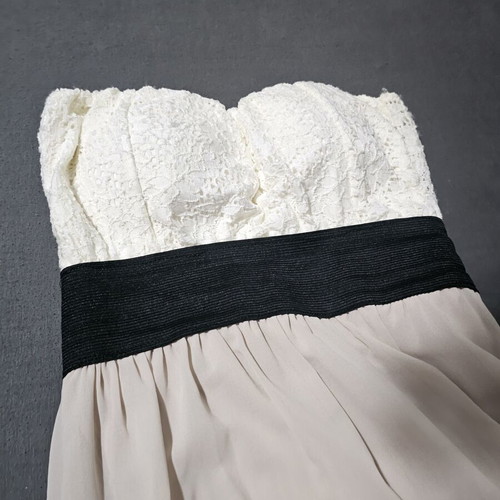 Strapless asymmetric dress with white lace bust