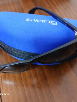 Swing sunglasses new with black plastic frame and men's lenses