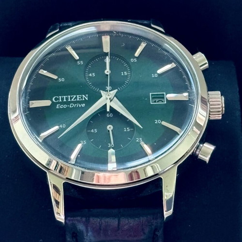 Citizen Eco Drive CA7069-24X watch like new, green dial, leather strap