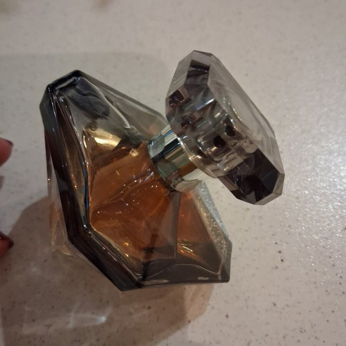 La Nuit Tresor 30 ml perfume, missing a small amount