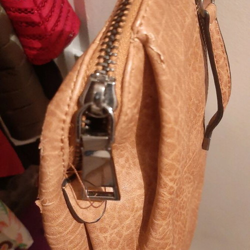 Backpack used with minor scratch on side