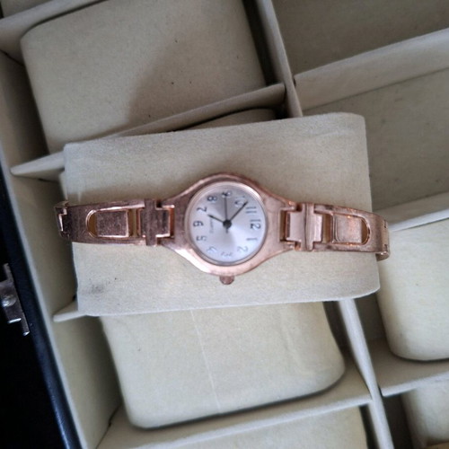 Rose gold-tone women's watch used, good condition