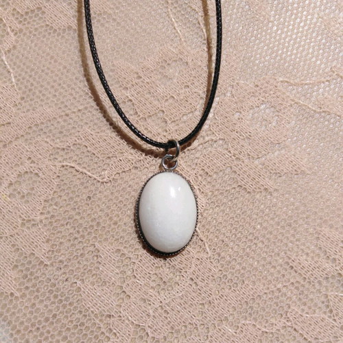 Handmade pendant with white nephrite and steel cabochon