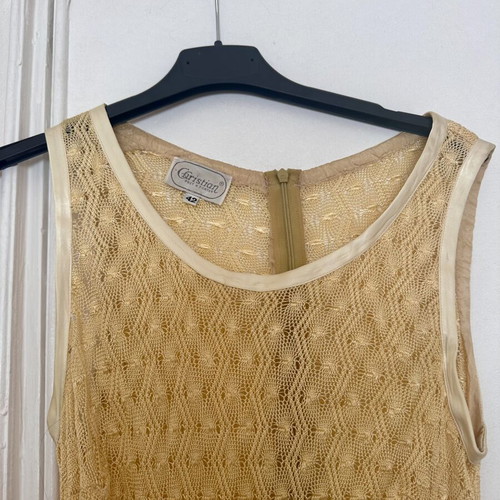 Yellow sleeveless knitted dress like new with geometric pattern and white trims