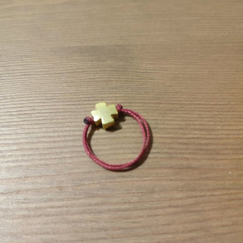 Handmade ring with cross used, gold tone and burgundy cord