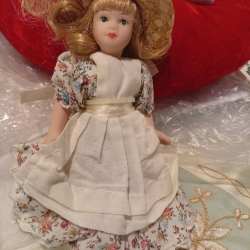 Porcelain doll DeAgostini new with handmade straw hat 15cm