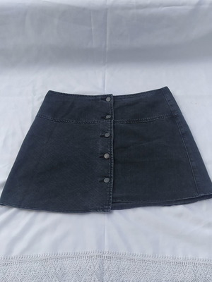 Black denim skirt used, size large with buttons