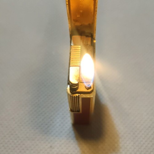 S.T.Dupont lighter like new, gold and red, refillable gas