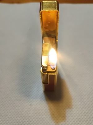 S.T.Dupont lighter like new, gold and red, refillable gas
