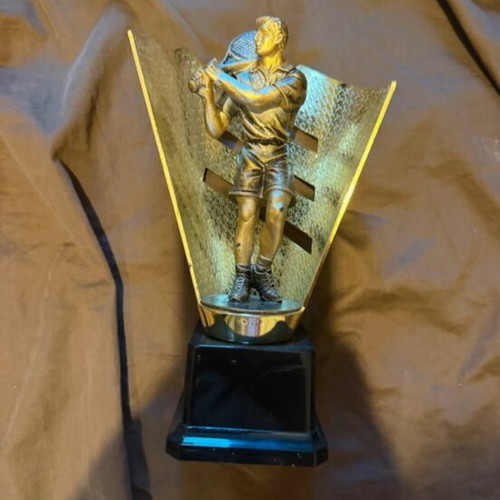 Award trophy used with tennis player figure for padel tournaments