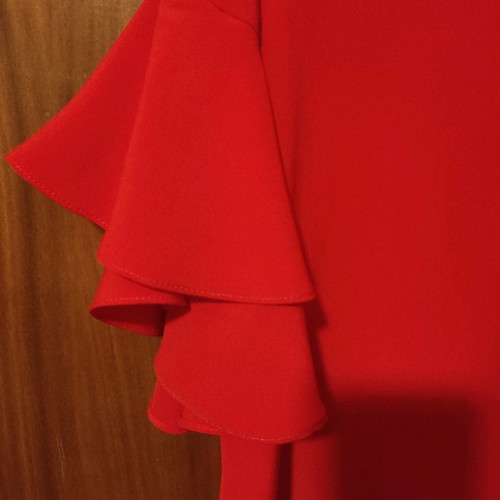 Desiree blouse new, size S, red with ruffled sleeves
