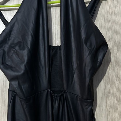 No Stress leather jumpsuit size S used with deep neckline and crisscross tie