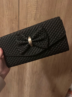 Black clutch bag with bow and gold chain like new