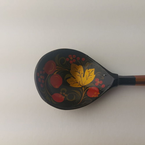 Old painted wooden spoon used