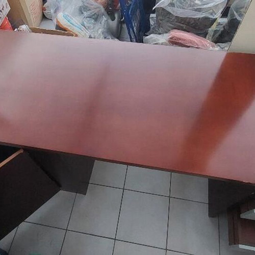 Desk used, large rosewood construction with storage and glass top
