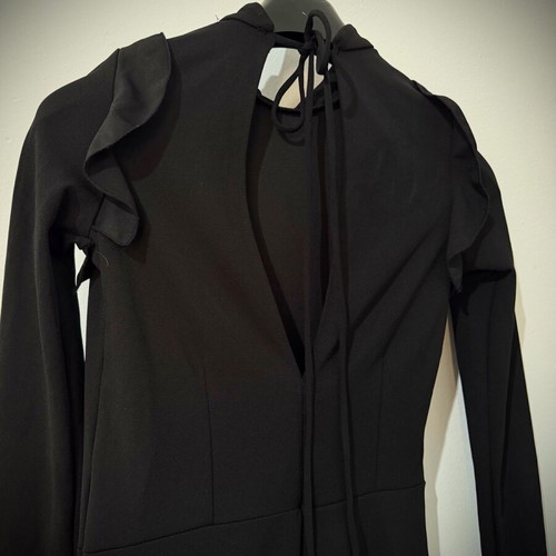 Zara one-piece shortsuit used, black with ruffles and open back