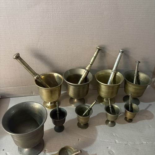 Set of 10 brass mortars and pestles