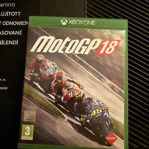 Xbox One Fat 500 GB console with MotoGP 18 game and controller