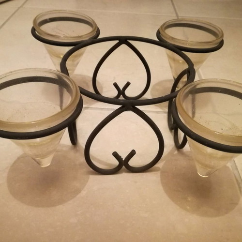 Metal candle holder used for four tealight candles