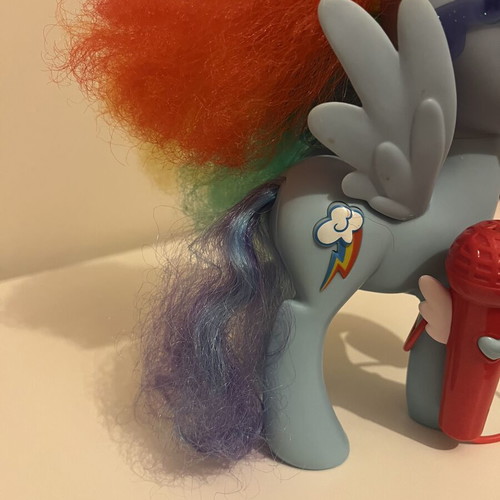 My Little Pony Singing Rainbow Dash figure used with microphone and music