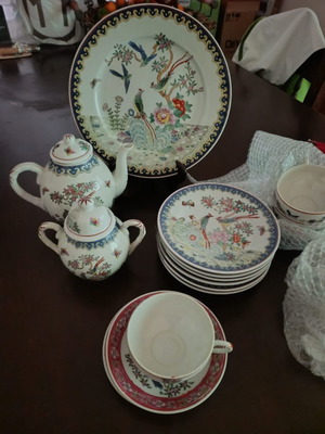 Oriental tea set like new with kettle, plates and cups
