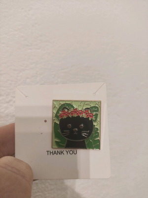 Art cat pin with flower crown like new