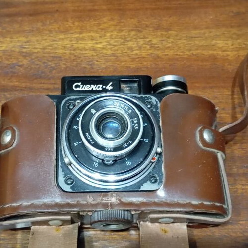 Retro Smena-4 camera used with leather case and tripod mount