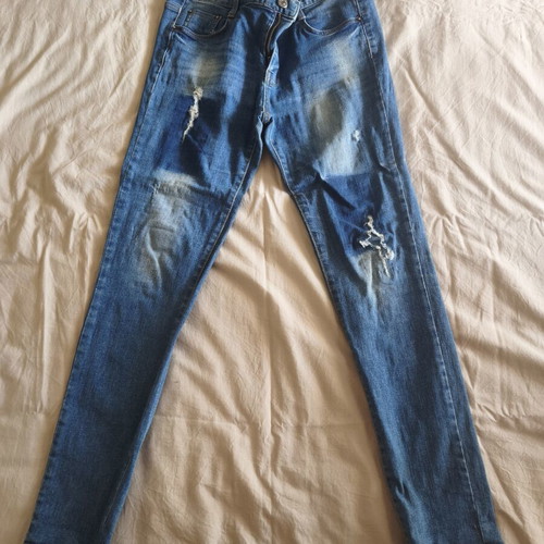 Elastic slim fit blue jeans, size large