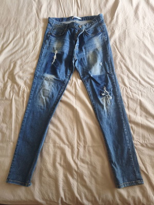 Elastic slim fit blue jeans, size large