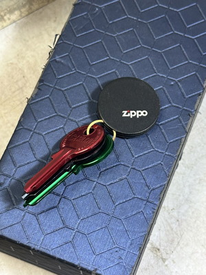 Zippo keychain with 3 colored keys used