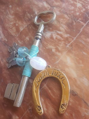 Lucky key charm with horseshoe