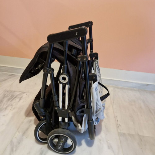 Baby stroller used, lightweight, foldable with rain cover