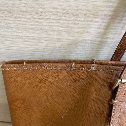Michael Kors bag used with wear on the trim