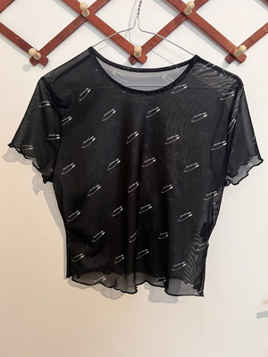 Top black transparent with safety pin design one size used