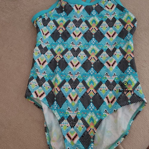 One-piece swimsuit like new, printed turquoise for ages 6-7