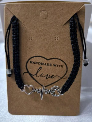 Handmade bracelet with scratch new, black and silver