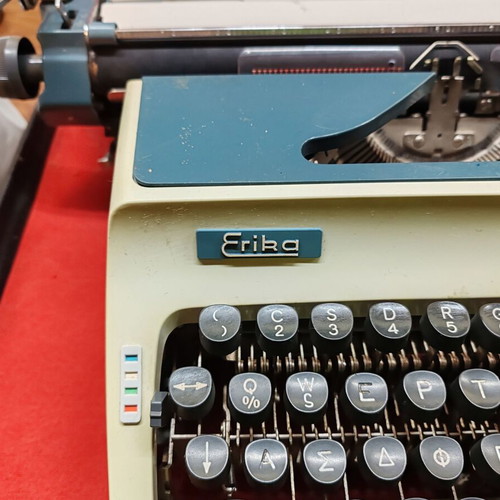 Erika vintage typewriter used with case