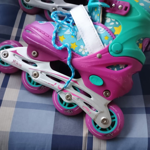 Xspot Kids Roller Skates size 31-33, like new, colorful