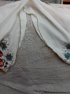 Handmade Chevres table linens with two smaller gifts
