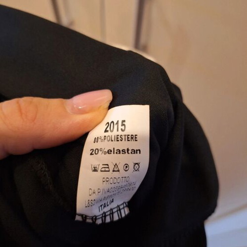 Elastic bell-bottom pants one size fits S and M like new, black and white